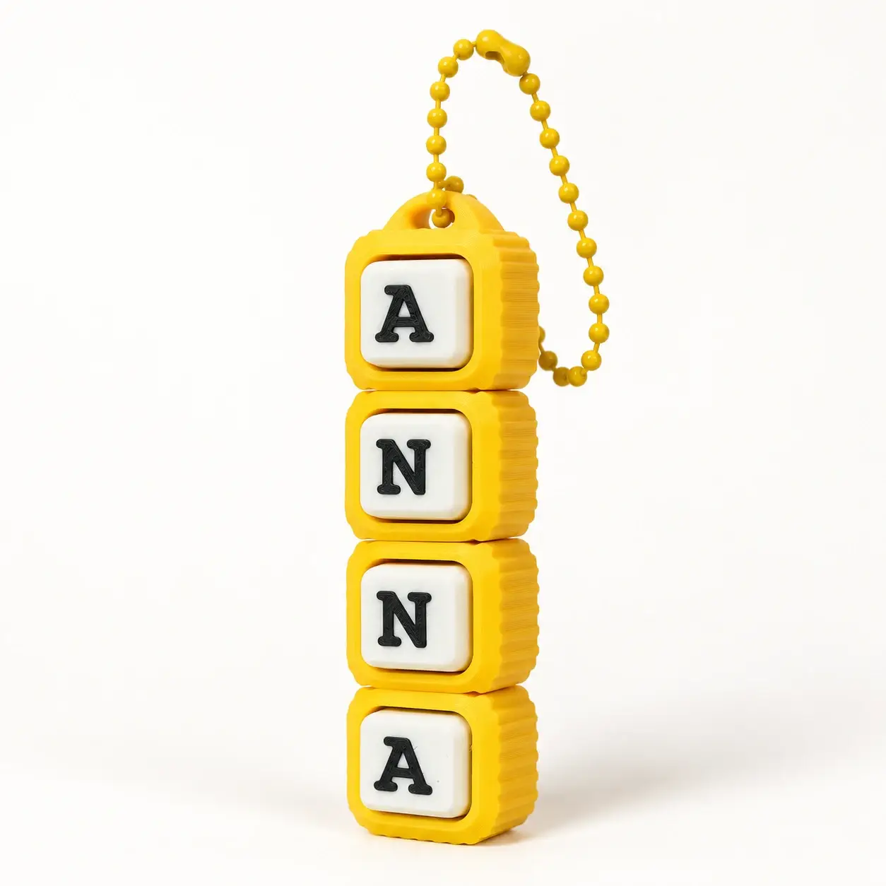 Heart Path Clicker, Yellow ANNA, a small printed item in the pictured colors