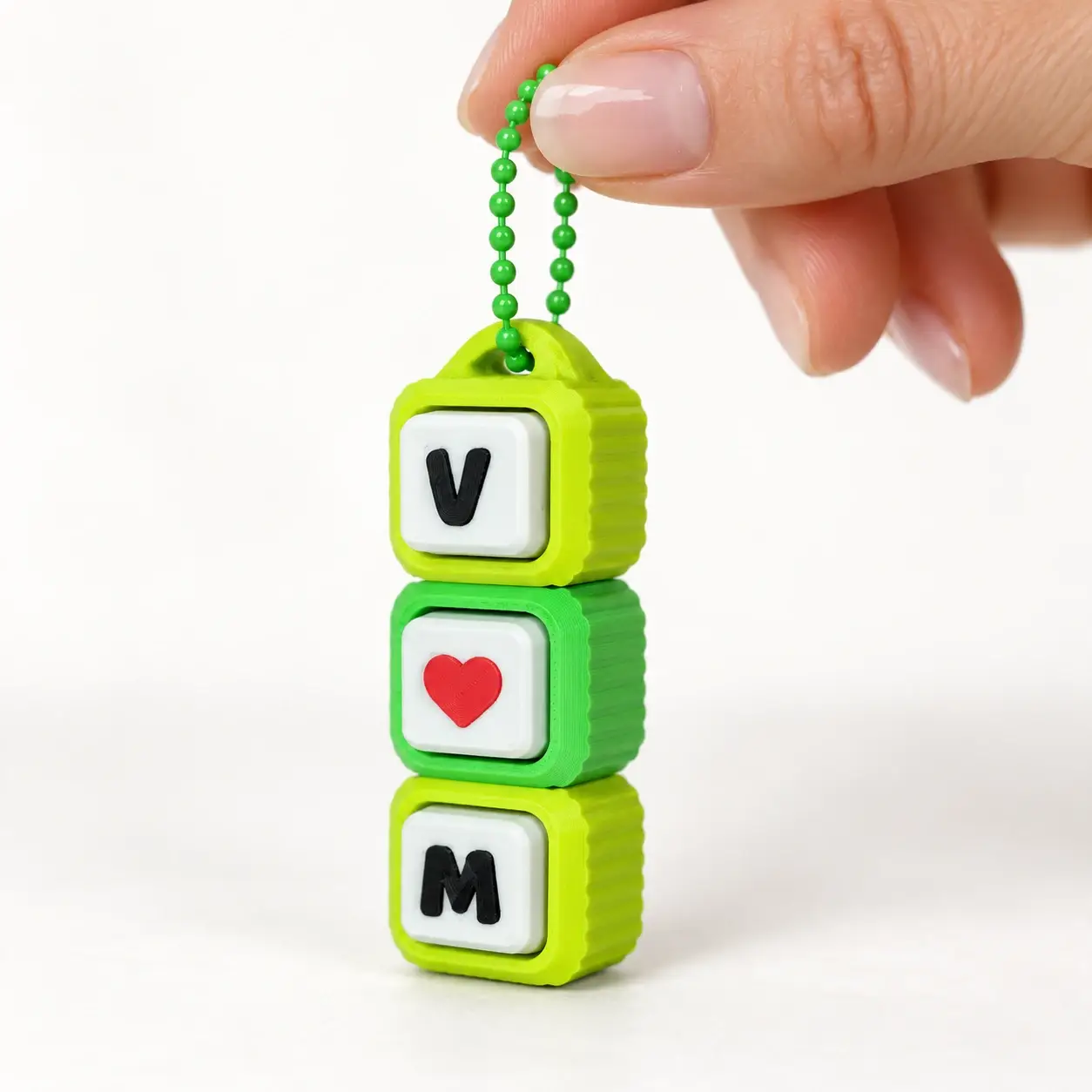 Heart Path Clicker, Green VM heart, a small printed item in the pictured colors