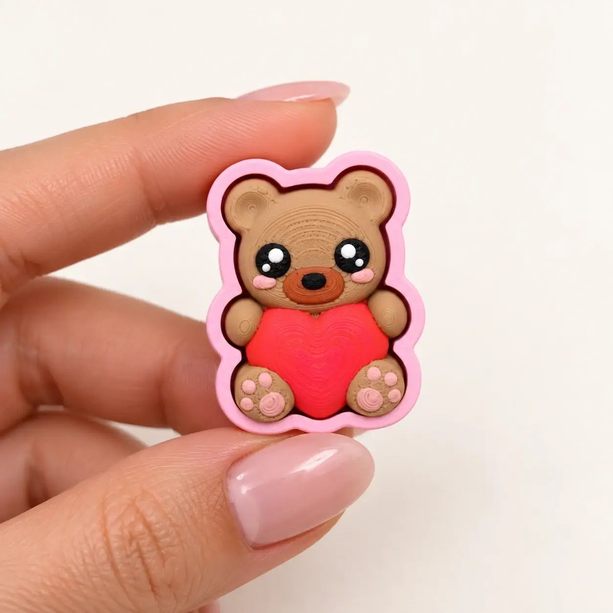 Sweet Valentine Clickers, Teddy with heart, a small printed item in the pictured colors