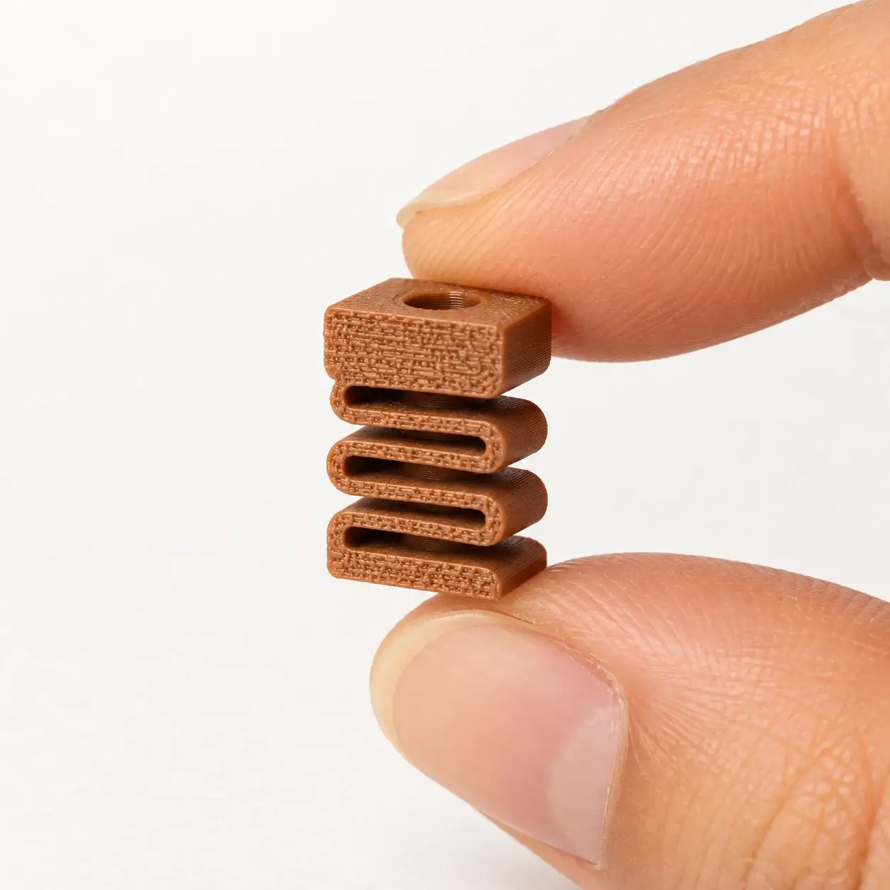 Silent Dummy Clicker Insert, Brown insert, a small printed item in the pictured colors