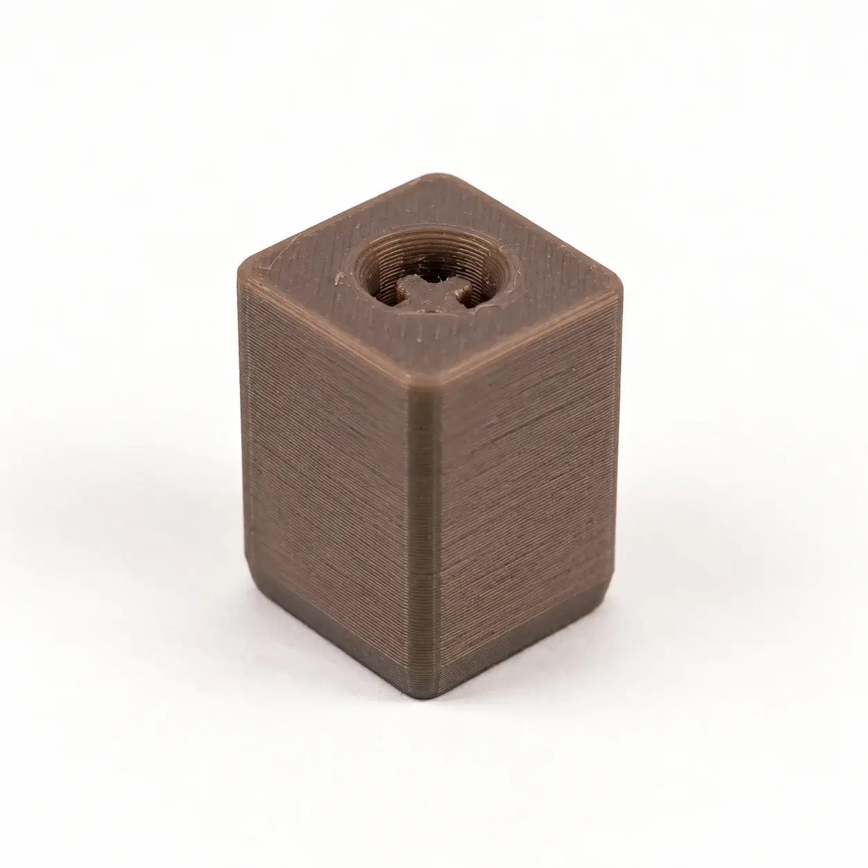 Clicker Keychain Adapter, Gray rigid adapter, a small printed item in the pictured colors