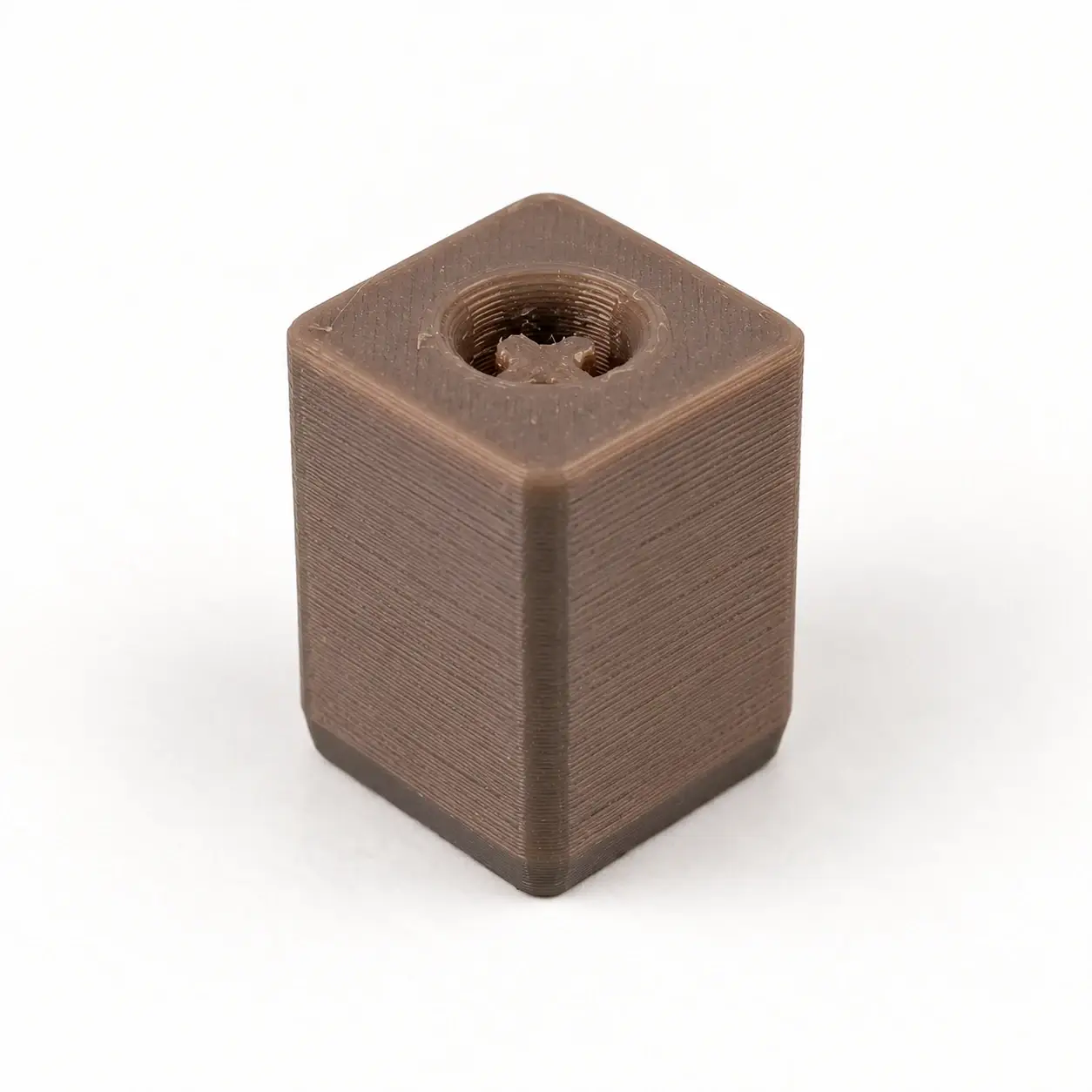 Clicker Keychain Adapter, Gray rigid adapter, a small printed item in the pictured colors