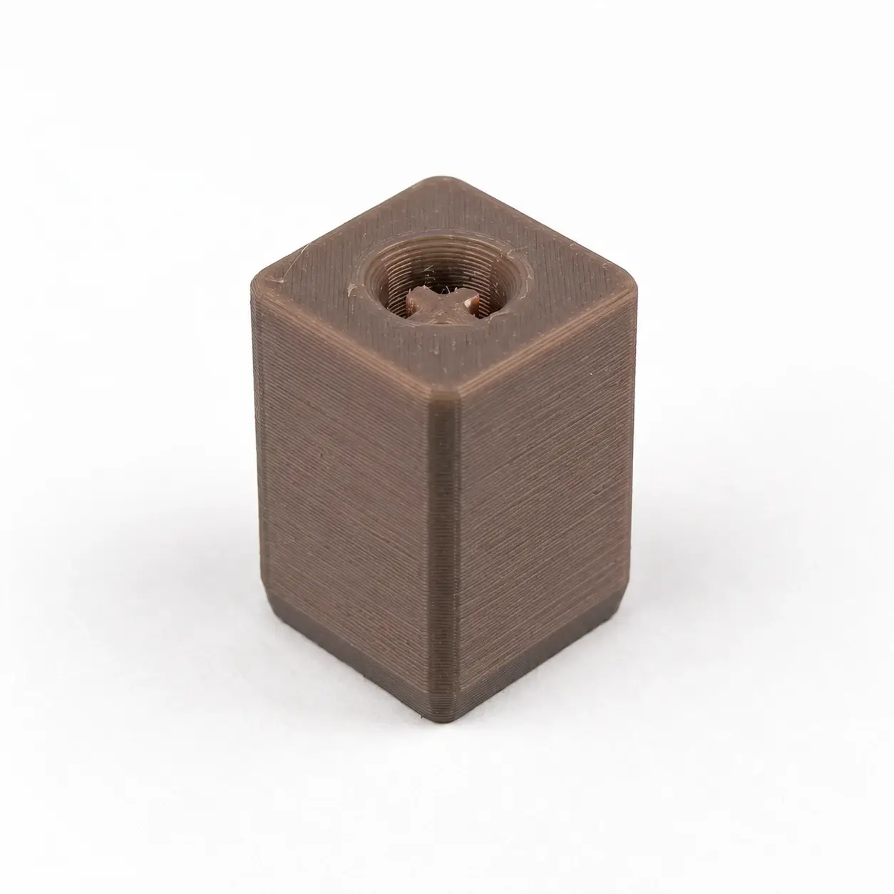 Clicker Keychain Adapter, Gray rigid adapter, a small printed item in the pictured colors