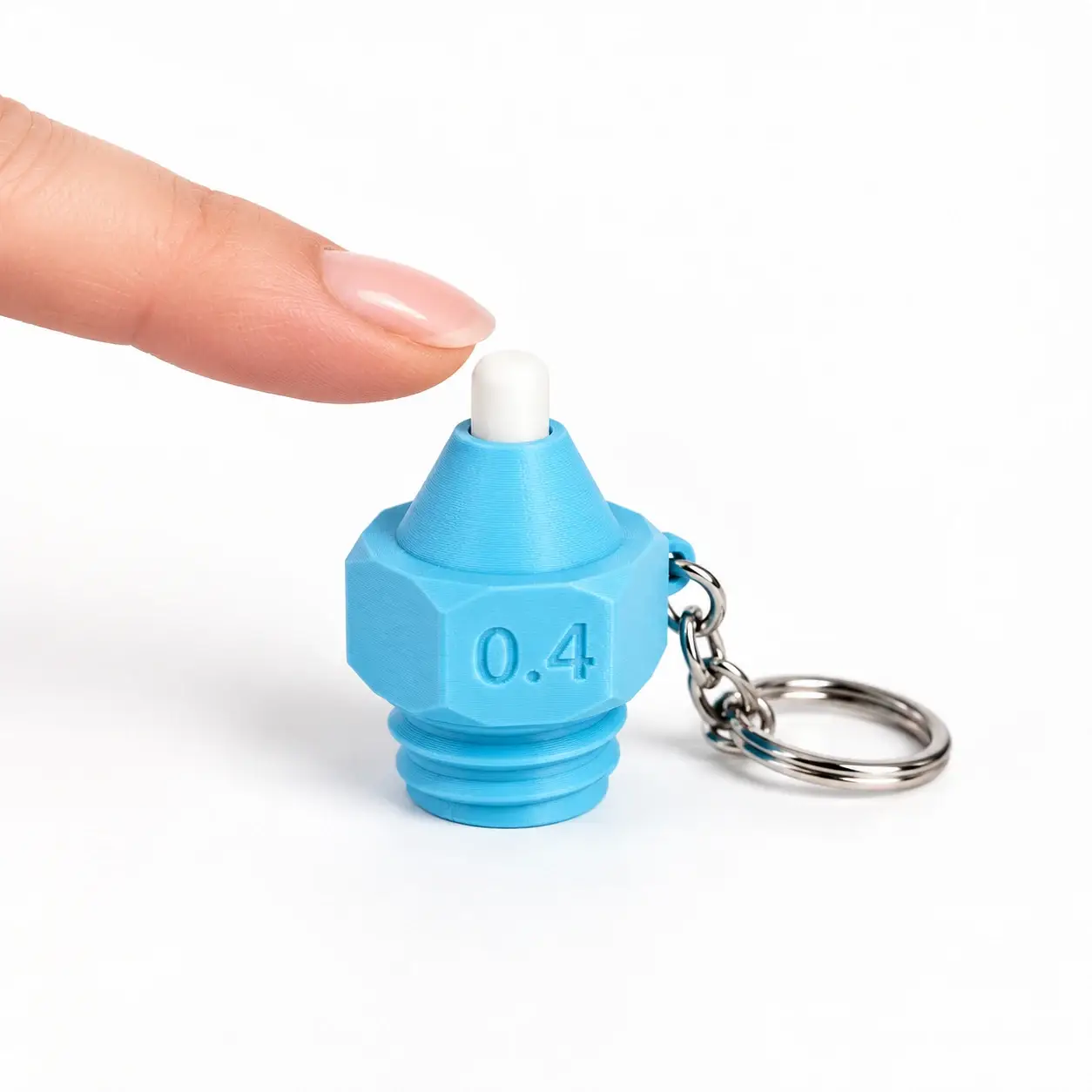 Printer Nozzle Clicker, Blue - white tip, a small printed item in the pictured colors