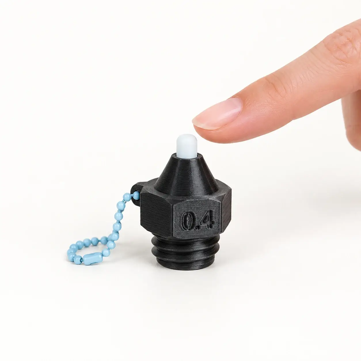 Printer Nozzle Clicker, Black - white tip, a small printed item in the pictured colors