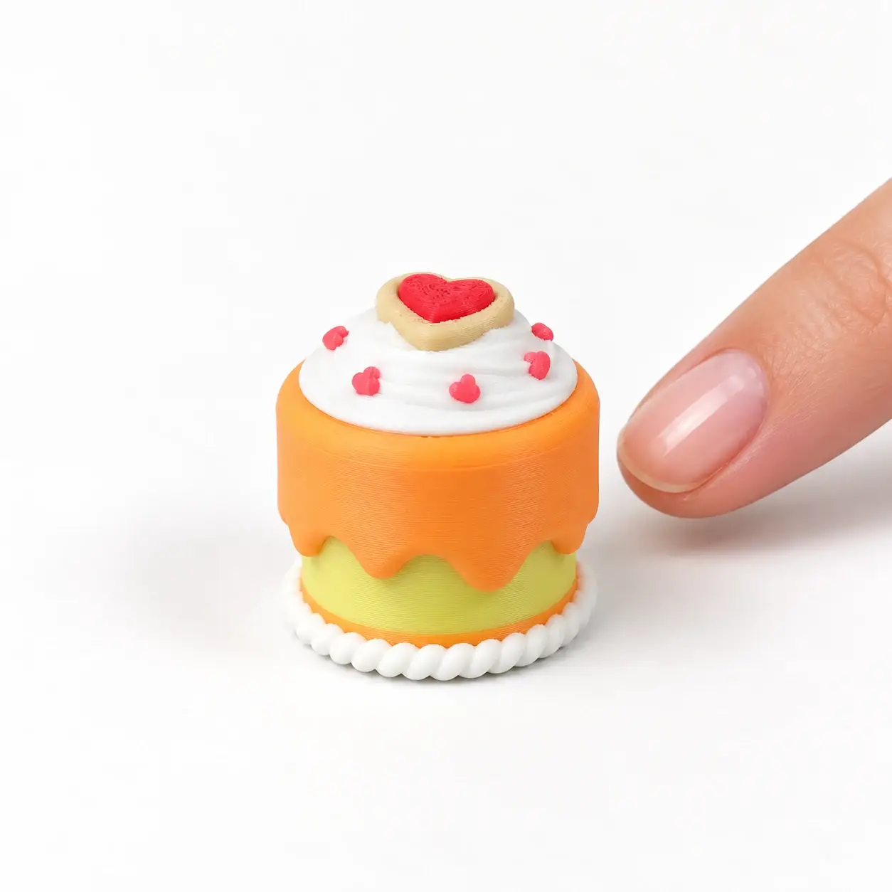 Cake Slice Clickers, Orange heart cake, a small printed item in the pictured colors