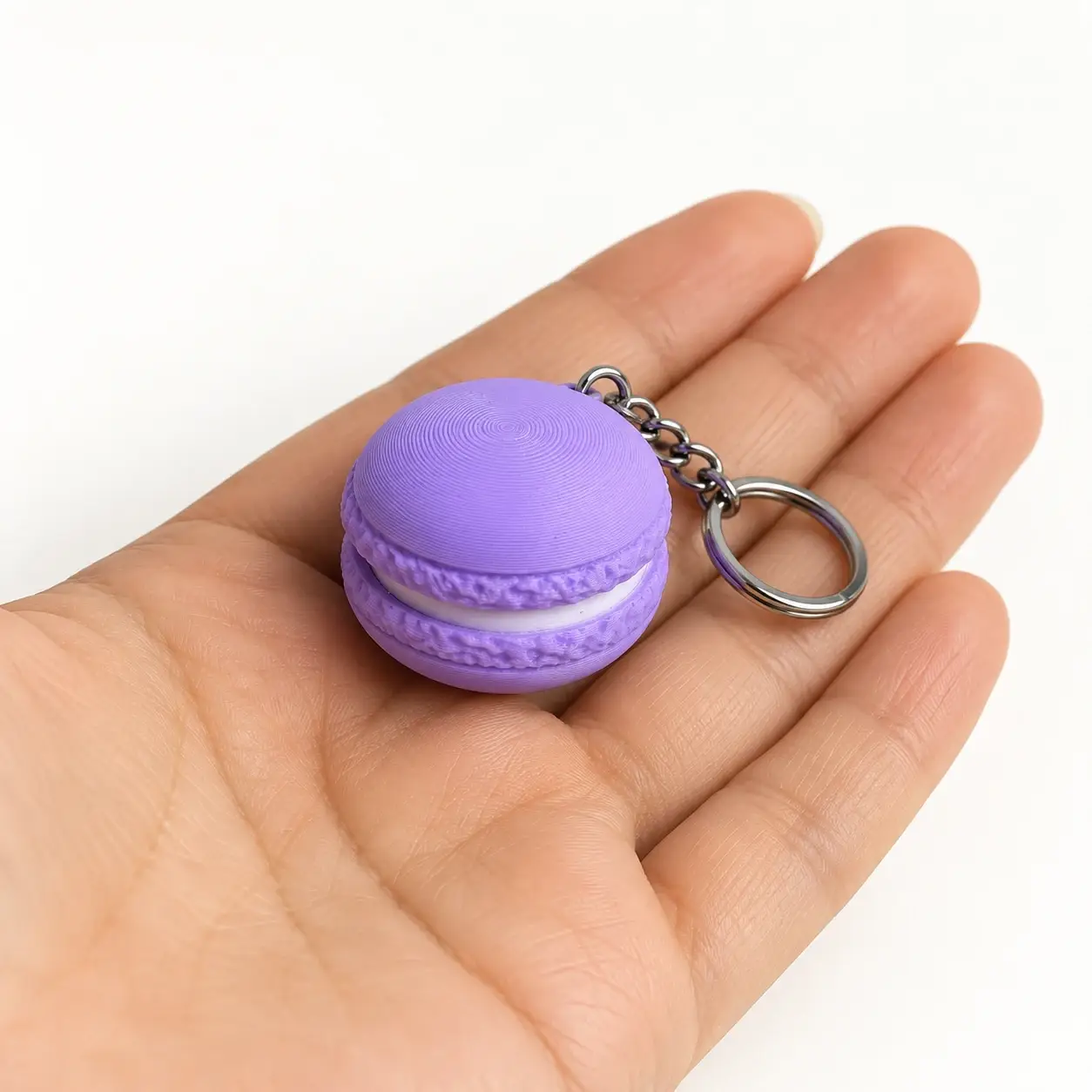 Macaron Clicker, Lavender, a small printed item in the pictured colors