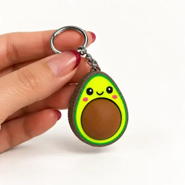 Avocado Clickers, Brown pit avocado, a small printed item in the pictured colors
