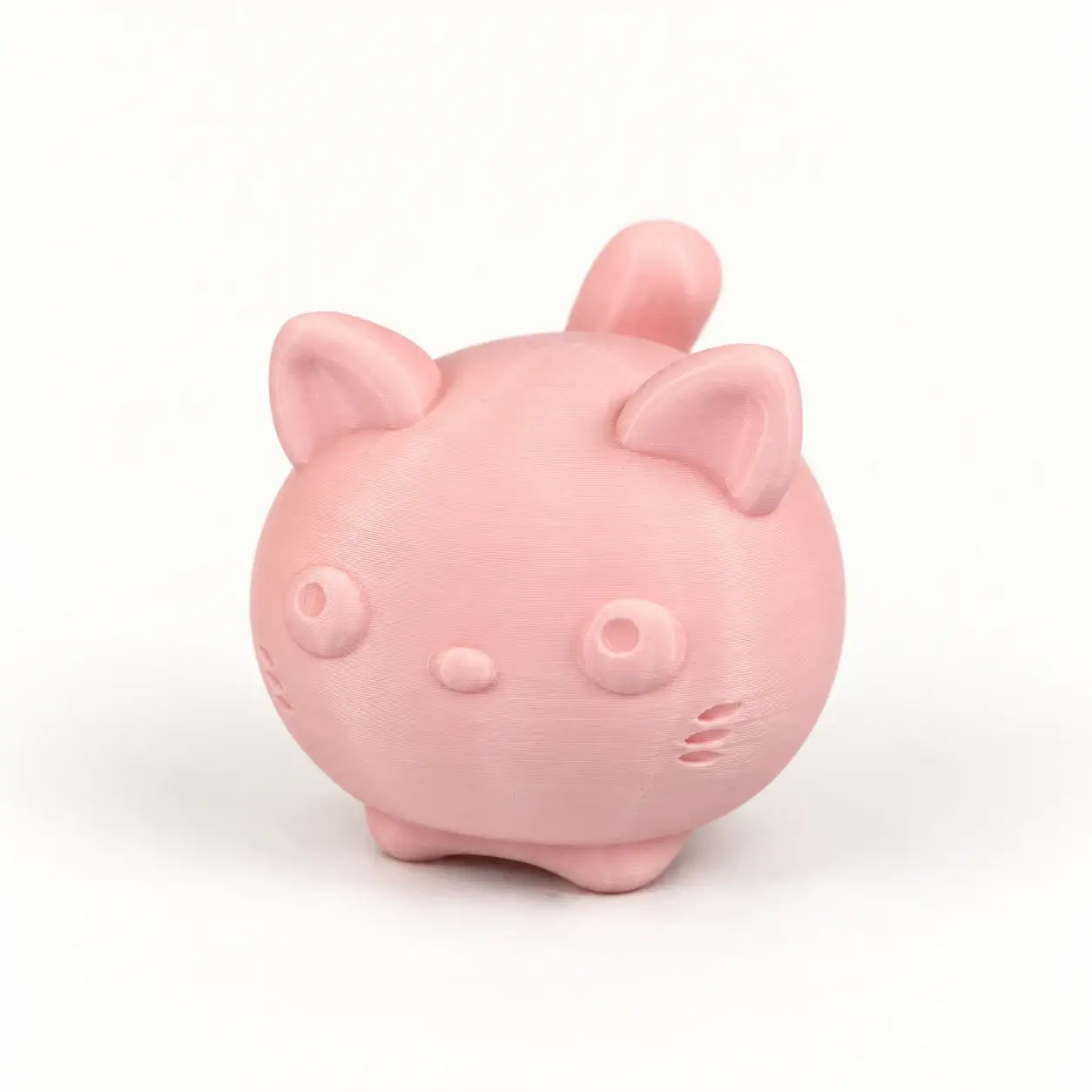 Cat Clicker, Pink - embossed face, a small printed item in the pictured colors