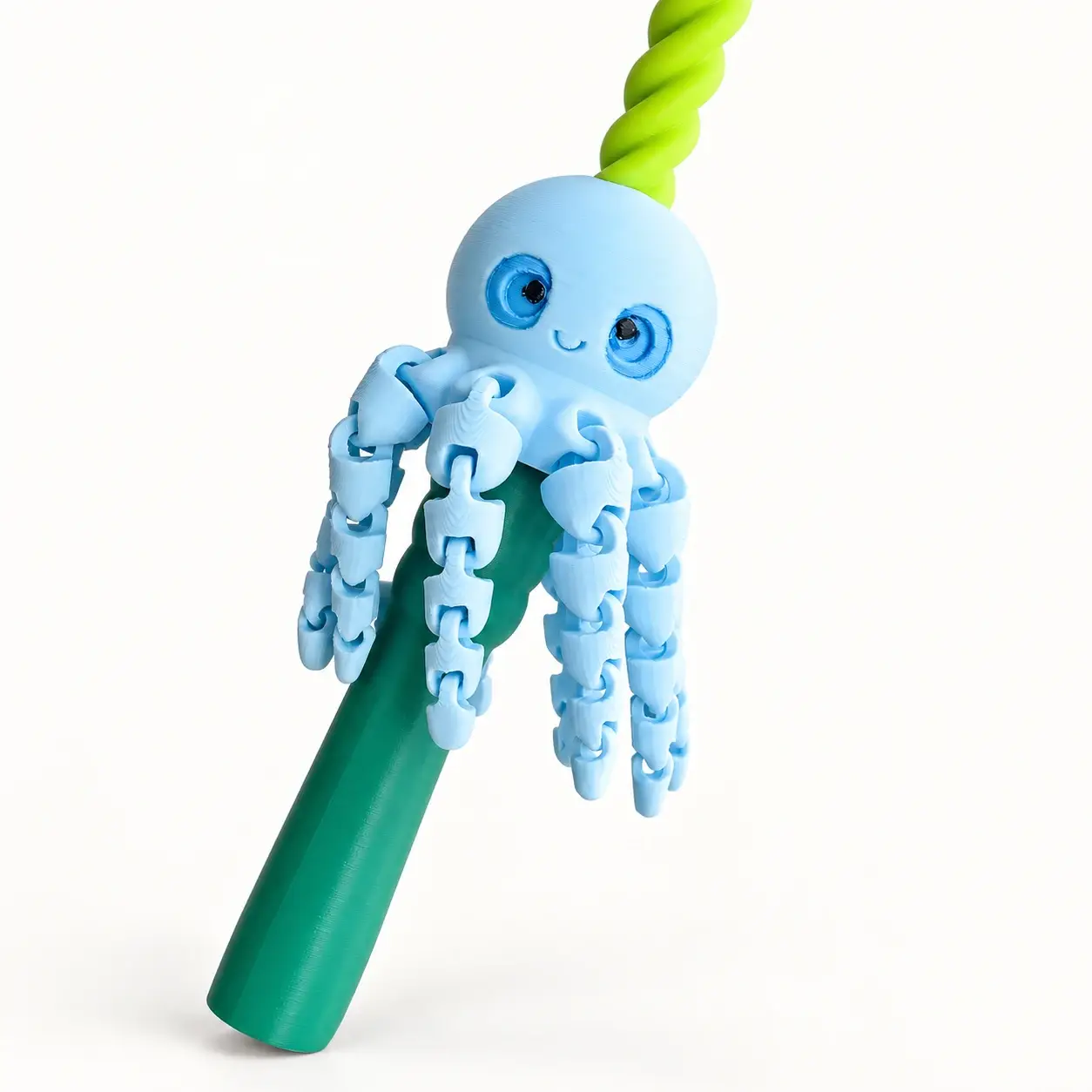 Close view of the blue octopus face and articulated tentacle links