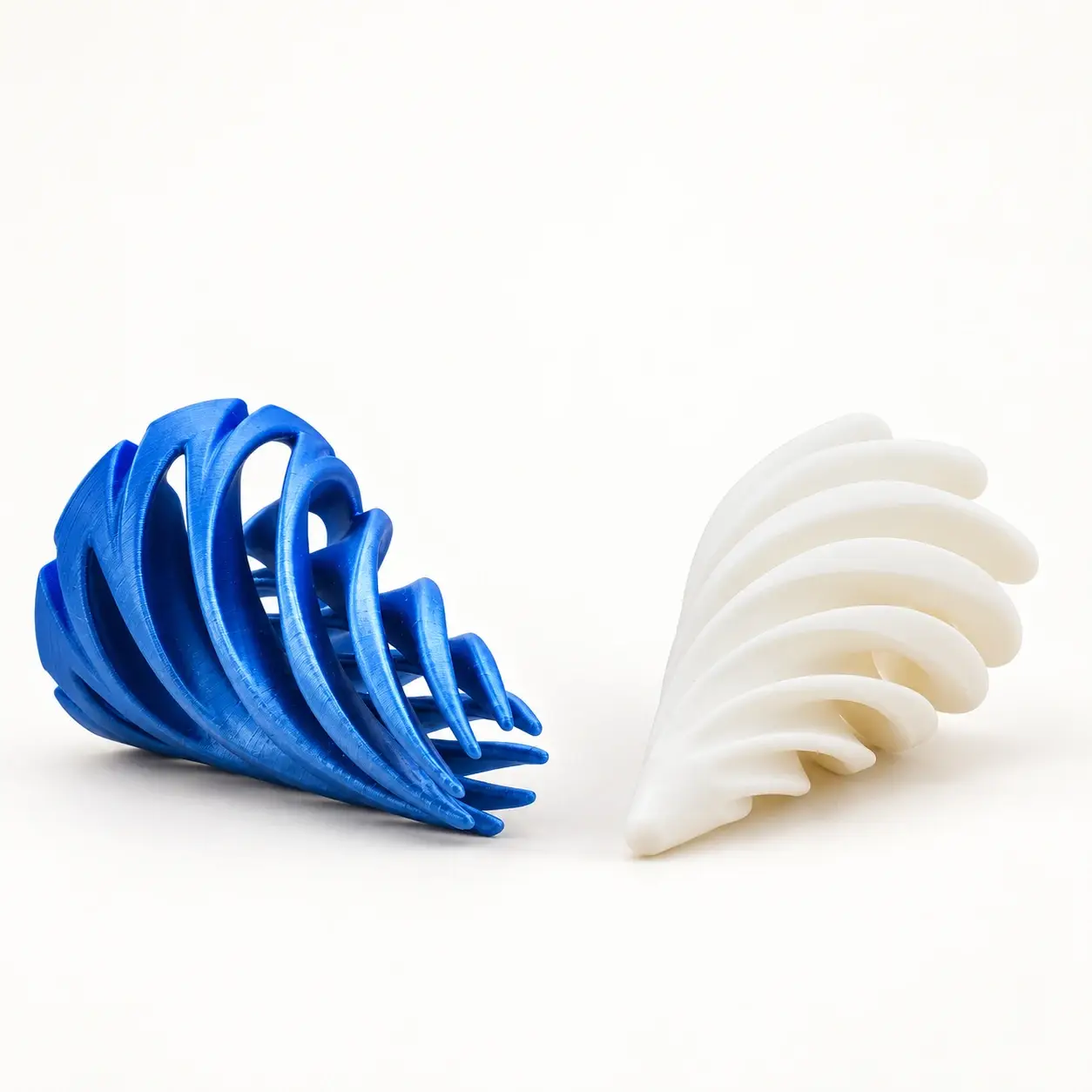 Blue outer spiral cage and white inner cone shown separately